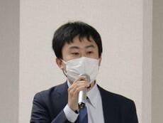 新規1万者支援プログラムについて説明する野坂氏